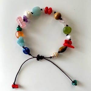 Natural stone bracelet. Cord with extensor knot. Max. 3.5in. Min. 2in